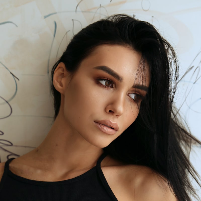 Beautiful Young Woman With Dark Makeup