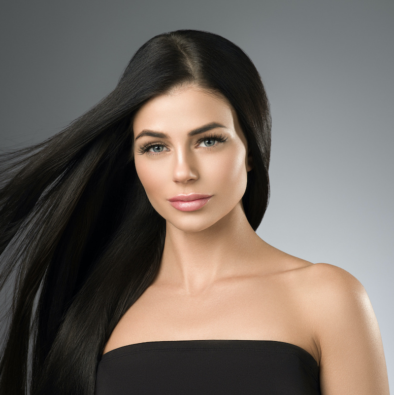 laser young woman with flowing dark hair